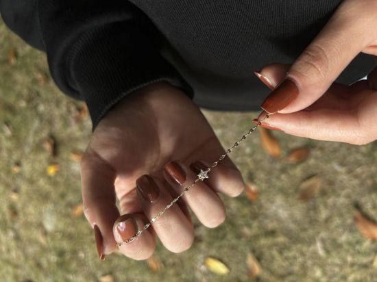 Kelebek Zincir Yıldızlı Taşlı Bileklik, 0,69 gram ve özenli işçilikle Altın Yıldız Bileklik’in günlük ve özel kullanıma uygun bir Goldium modelidir.