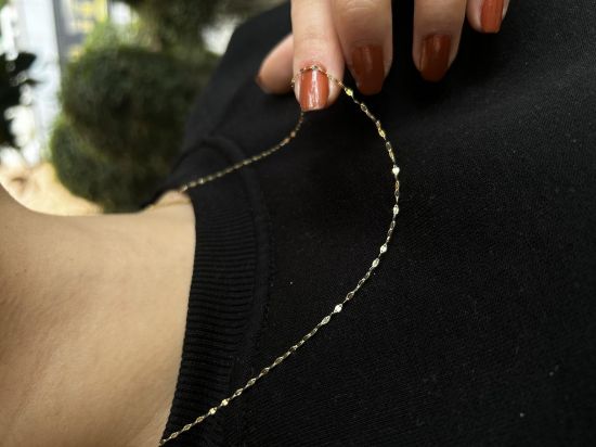 "Kelebek zincir kolye, 1,03 gram tasarımıyla Altın Kolye kategorisinde, Goldium imzasıyla modern bir görünüm sunar