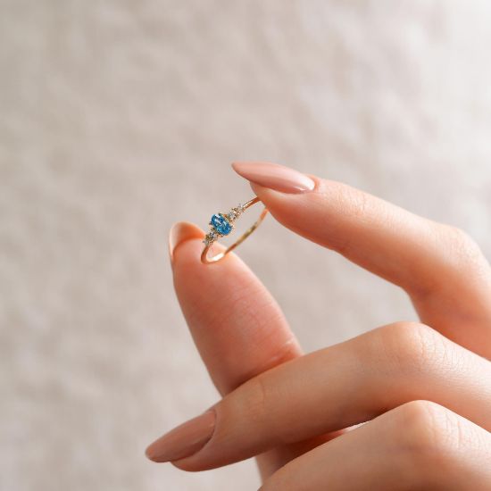 "14  Ayar Altın Baget Taşlı Yüzük, 1,05 gram, Goldium ustalığı ve Altın Baget Yüzük modeli ile uzun ömürlü kullanım sağlar