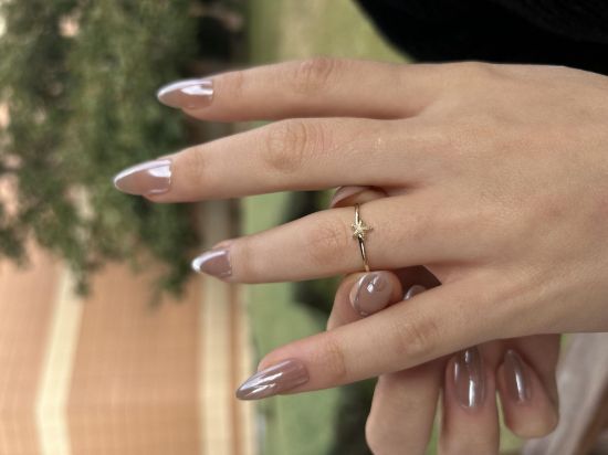 "14 Ayar Altın Deniz Yıldızı Yüzük, 0,85 gram, Goldium ustalığı ve Ebru Sever Türk'ün Favorileri modeli ile uzun ömürlü kullanım sağlar